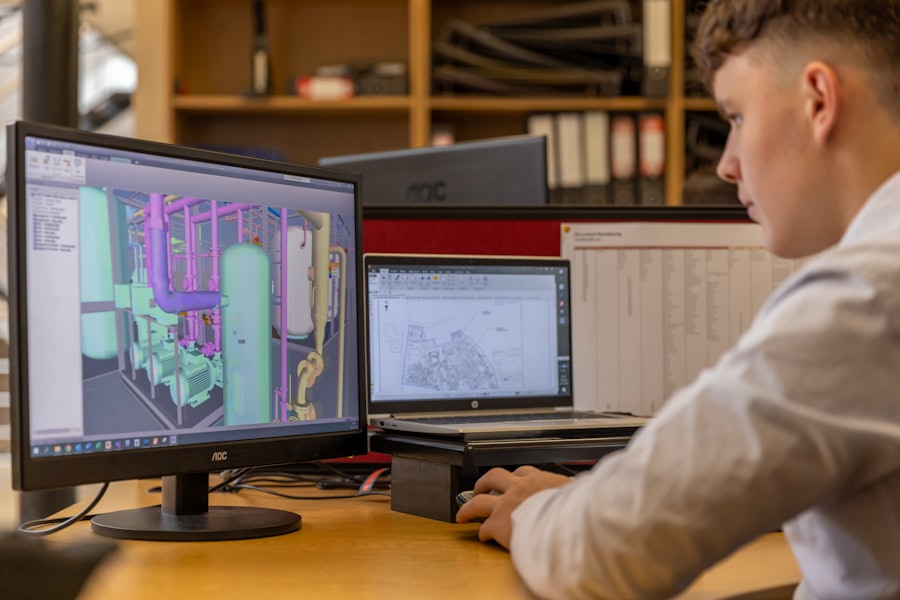A person carefully reviewing information on a screen at a desk