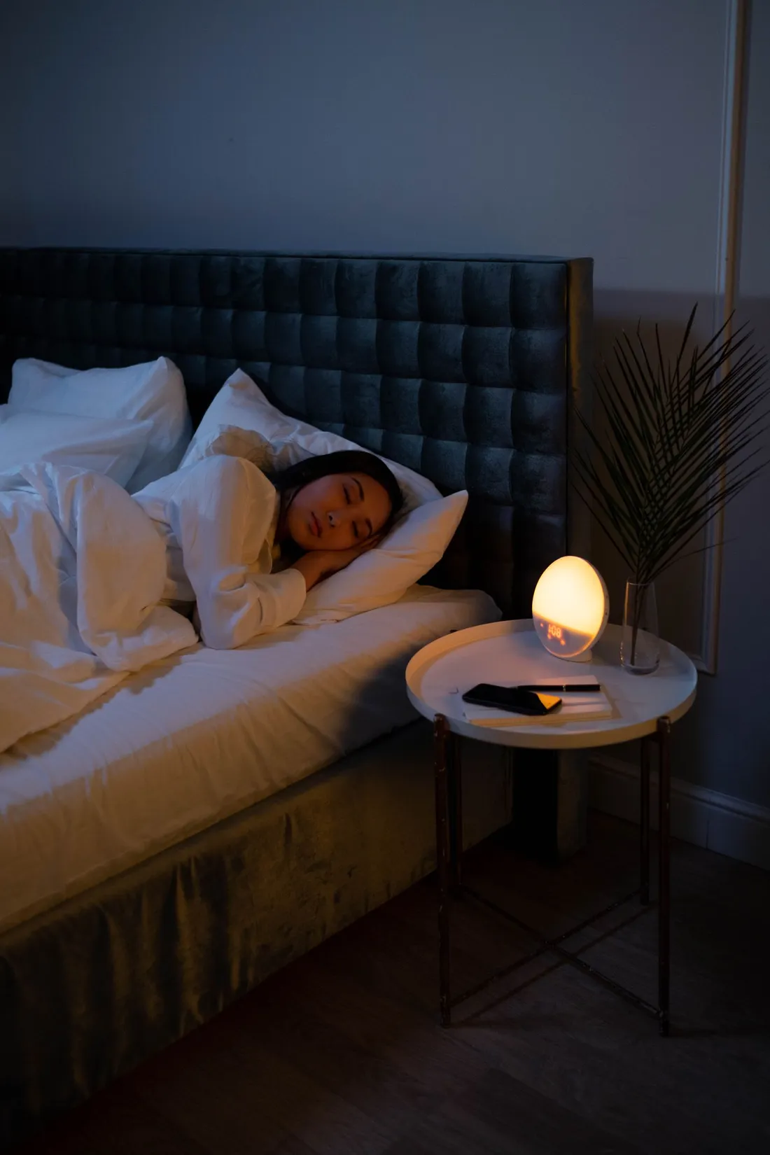 A woman sleeping peacefully in bed