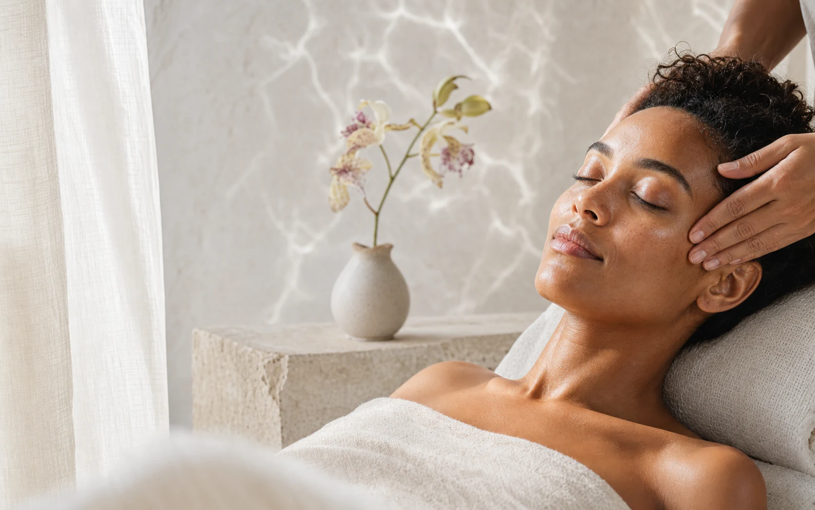 Client relaxing during a professional facial ritual